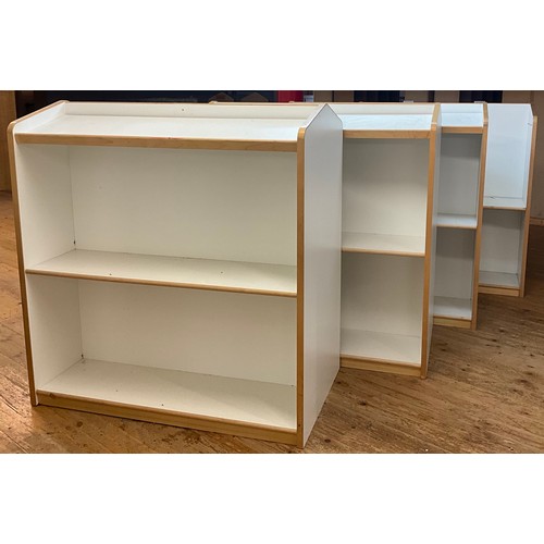 108 - A set four of shop display units, double sided with three shelves, one missing shelves, 133cm high, ... 