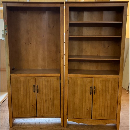 115 - A pair of pine library bookcases or display units, one missing shelves, 184cm high, 82cm wide, 34cm ... 