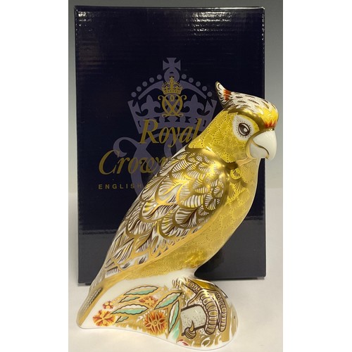 5042 - A Royal Crown Derby paperweight, Citron Cockatoo, gold stopper, 14cm, printed mark in red, boxed