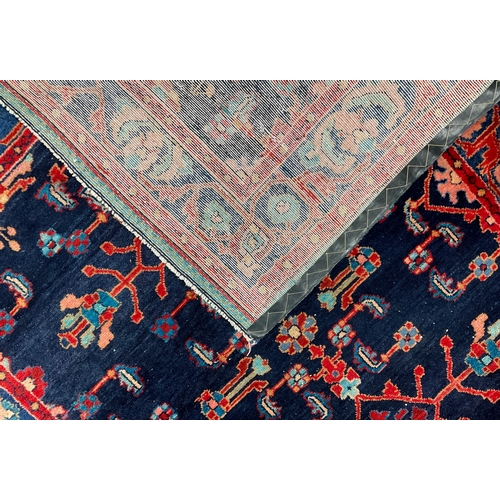 196 - A Hand-knotted Persian Malayer type woollen tribal rug, 203cm x 158cm.