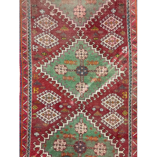 207 - A Kazak type hand-knotted rug, 272 cm x 145 cm, mid 20th century.