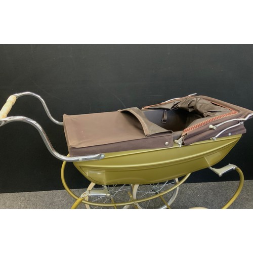 219 - A Silver cross pram in khaki green and brown, 75cm high.