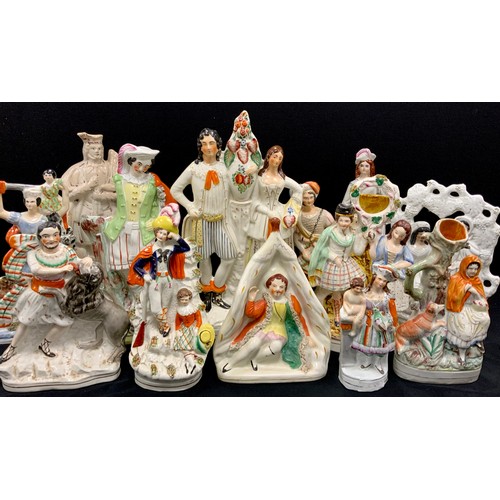 251 - A collection of Staffordshire flatbacks including; Courting couple with vase, 42cm high, fortune tel... 