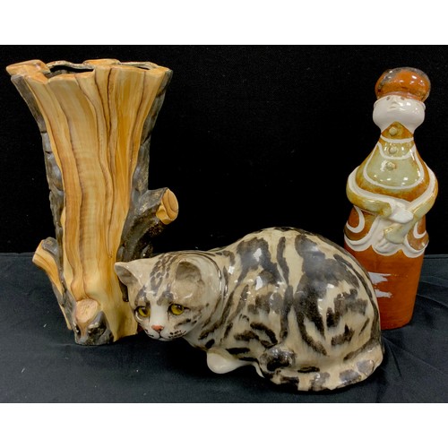 256 - A Winstanley Tabby cat, seated, 29cm long; a studio pottery figure by Eileen Hemsell, 32cm high;  mi... 