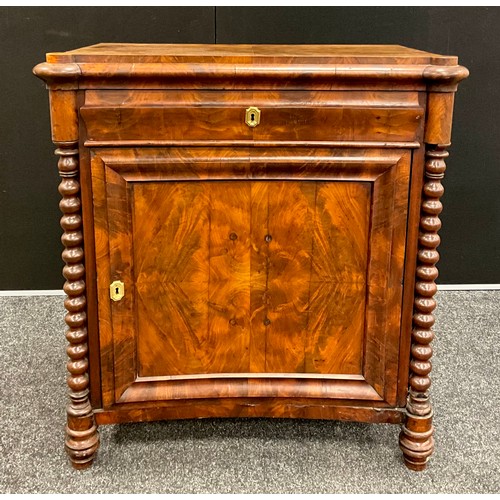 273 - A Biedermeier style flame mahogany cabinet, shaped top, slightly inverted-bow front with single draw... 