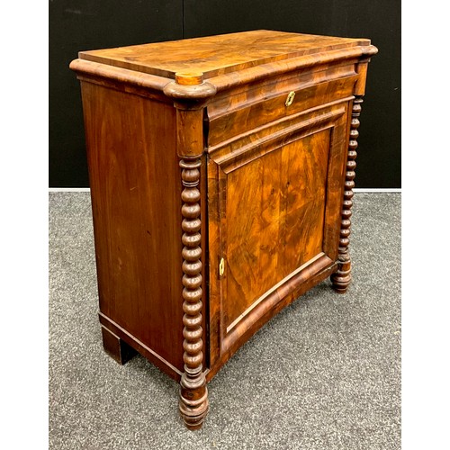 273 - A Biedermeier style flame mahogany cabinet, shaped top, slightly inverted-bow front with single draw... 