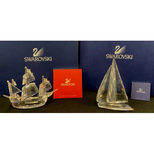 330 - Swarovski Crystal including; Santa Maria boat, 9cm high, Yacht, both with certificates and boxes (2)