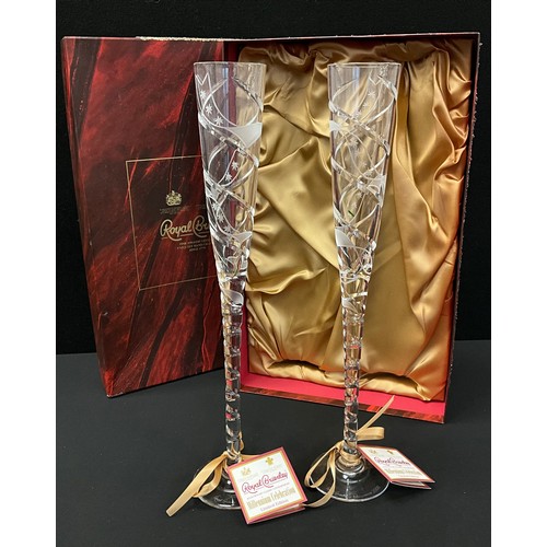 342 - A pair of Royal Brierley Crystal limited edition Millennium champagne flute drinking glasses, froste... 