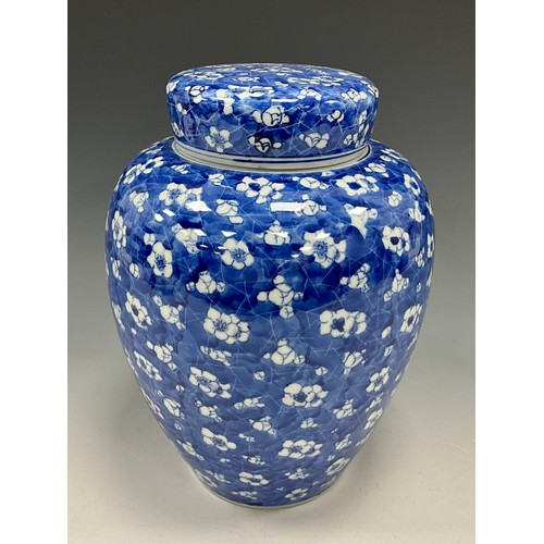 351 - A late Qing Chinese Blue and White Ginger Jar and cover, Cherry Blossom and Cracked Ice pattern, 26c... 