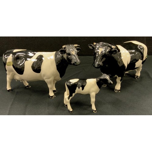 364 - Beswick Frisian cows including; Coddington Bull, CH Claybury Leegwater, calf (3)