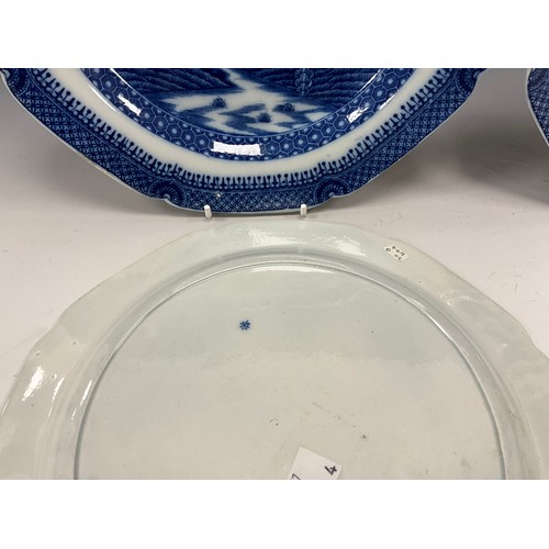 400 - A set of three 19th century English blue and white octagonal dinner plates and another similar, tran... 