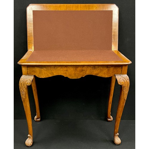 401 - A Georgian style walnut and burr walnut card table, lift-over top with baize playing surface to inte... 