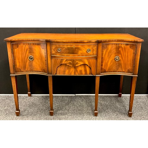 407 - A George III style mahogany serpentine front sideboard, slightly over-sailing top, two short drawers... 