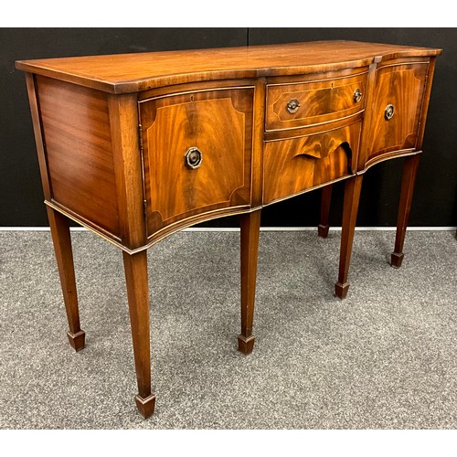 407 - A George III style mahogany serpentine front sideboard, slightly over-sailing top, two short drawers... 