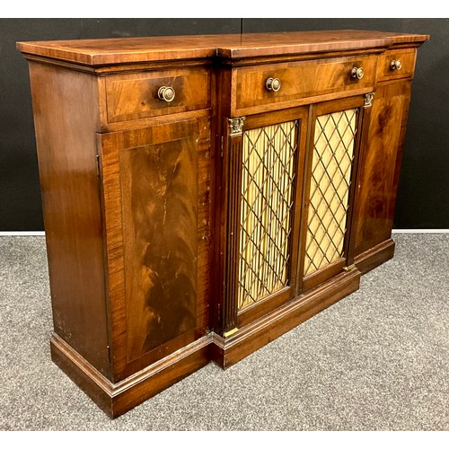 408 - A Regency style mahogany break-centre Chiffonier, with brass stringing to the slightly over-sailing ... 