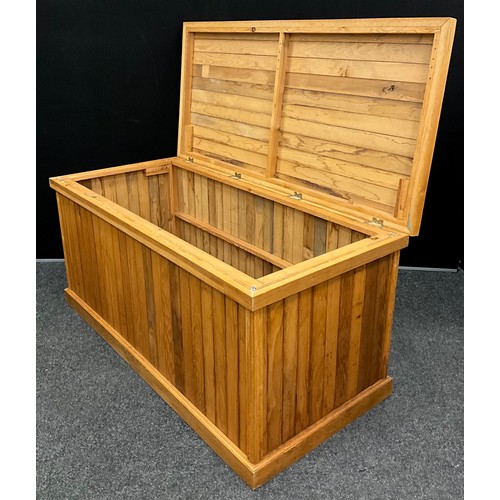 423 - A Large oak toy or storage chest, hinged lift-up lid, stepped base, 72.5cm high x 152cm wide x 71.5c... 