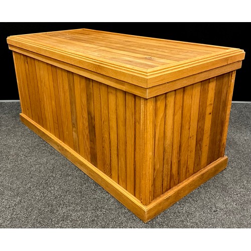 423 - A Large oak toy or storage chest, hinged lift-up lid, stepped base, 72.5cm high x 152cm wide x 71.5c... 