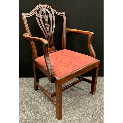 425 - A 19th century Hepplewhite style mahogany armchair, serpentine shaped top rail, carved flour-de-lis ... 