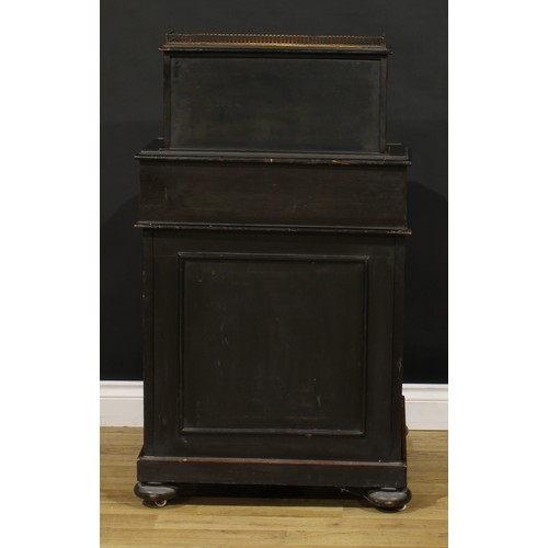 450 - A Victorian amboyna, ebonised and marquetry music room Davenport desk, canted rectangular superstruc... 