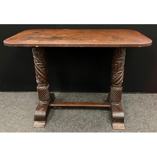 451 - A 19th century carved mahogany side table, rounded rectangular top, the twin pillar base carved with... 