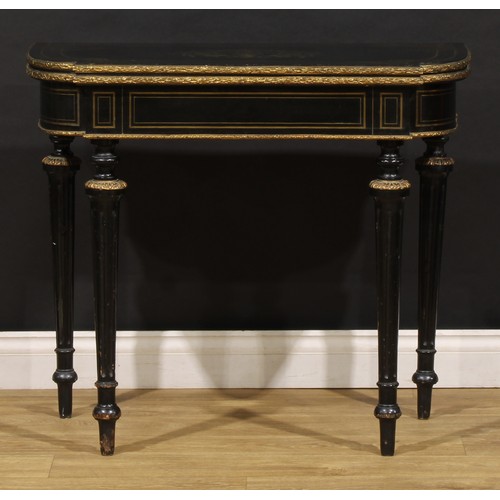 456 - A Napoleon III gilt metal mounted ebonised and brass marquetry card table, hinged top enclosing a ba... 