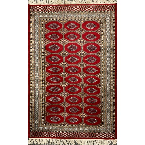 458 - A Bokhara type Rug / carpet, 188cm x 122cm.