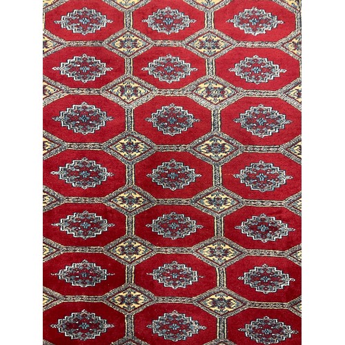 458 - A Bokhara type Rug / carpet, 188cm x 122cm.