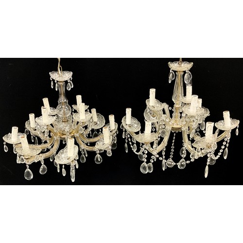 466 - A near pair of early to mid 20th century glass chandeliers, 1 with 8 arms, the other 6 with glass dr... 