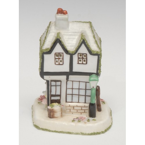 468 - A Coalport porcelain cottage, The Crooked Cottage, 10cm high; others, The Old Curiosity Shop, The Pr... 