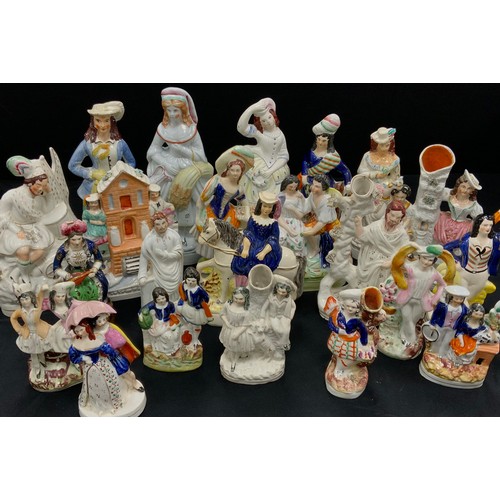 469 - A collection of 19th century Staffordshire flatbacks including; ‘The Duchess’, 24cm high, courting c... 