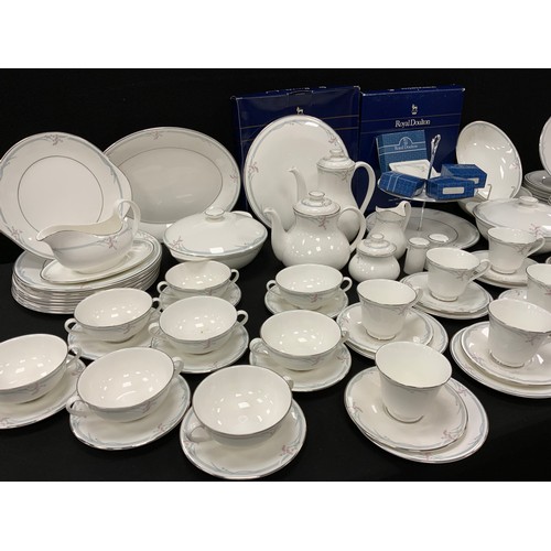 514 - Royal Doulton Carnation pattern table service for eight including; one meat platter, double cake sta... 