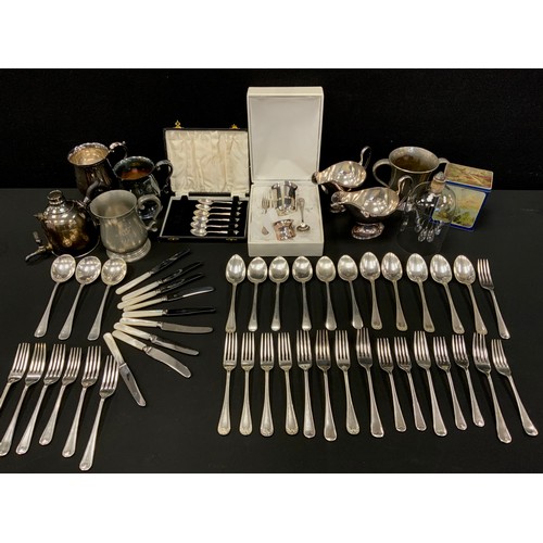 583 - A pair of silver plated sauce boats,  a Picard Ingenium Caffe,  assorted cased and loose flatware , ... 