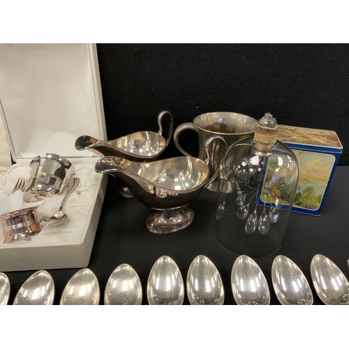 583 - A pair of silver plated sauce boats,  a Picard Ingenium Caffe,  assorted cased and loose flatware , ... 