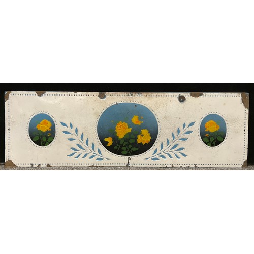 657 - A 20th century enamel sign, decorated in the French style with yellow roses,  122cm long