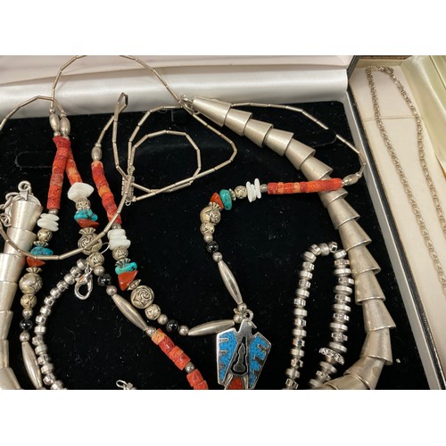 687 - A white metal conical interconnected tubular bead necklace, another smaller beads;  Mexican/ Navajo ... 