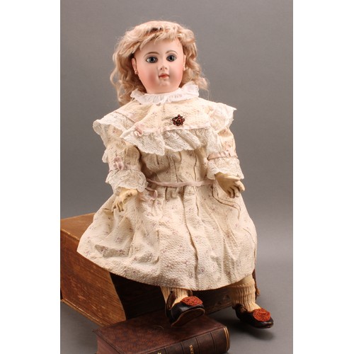 6411 - A Jumeau bisque head and fully jointed painted composition doll, inset fixed blue glass eyes, painte... 