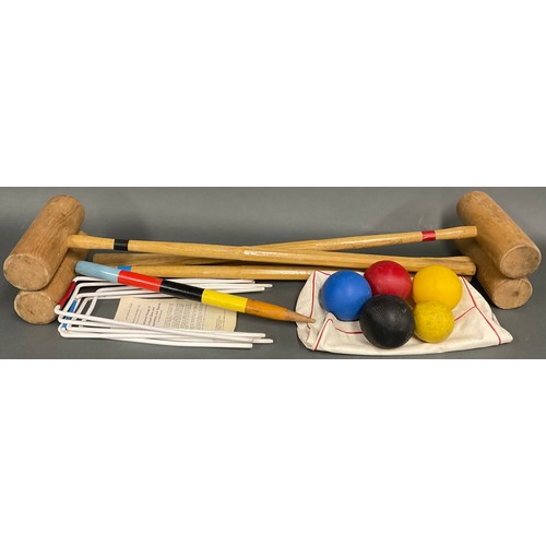 6432 - A croquet set, R. F. Landon & Partners Ltd., comprising mallets, hoops, balls and winning post, boxe... 