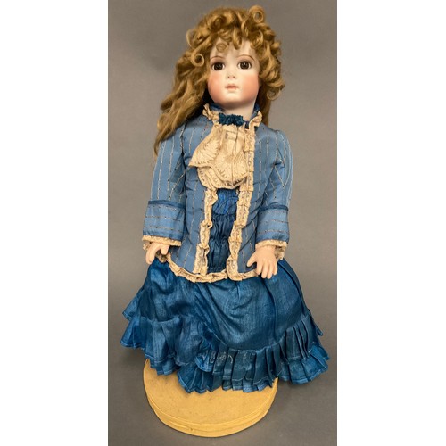 6415 - A reproduction bisque head doll, by Gina Saunders, for the Jackie Jacobs Collection, the bisque head... 