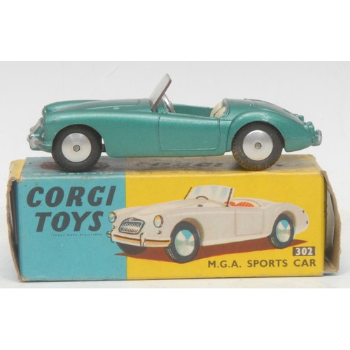 6008 - Corgi Toys - 302 M.G.A. Sports car, metallic green body, green and cream interior, windscreen intact... 