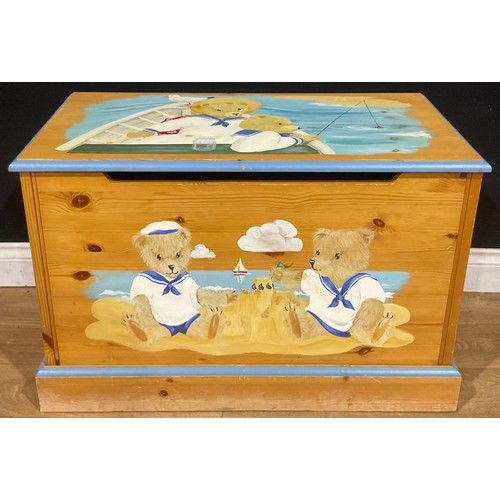 6431 - A pine rectangular toy box/chest, hinged top, painted to the top and front with teddy bears in sailo... 