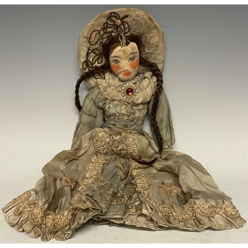 6409 - A 17th/18th century painted cloth doll as Queen Anne or high society Lady, wearing a halo headdress,... 