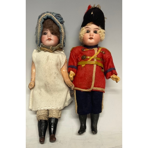 6413 - An Armand Marseille 1894 bisque head soldier boy doll, fixed eyes, open mouth, blond curly hair, wea... 