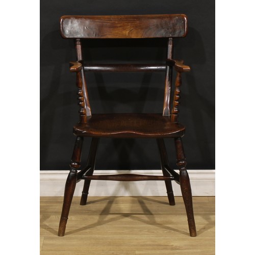 2468 - An early 19th century elm and beech bar back Windsor elbow chair, serpentine arms on bobbin-turned s... 