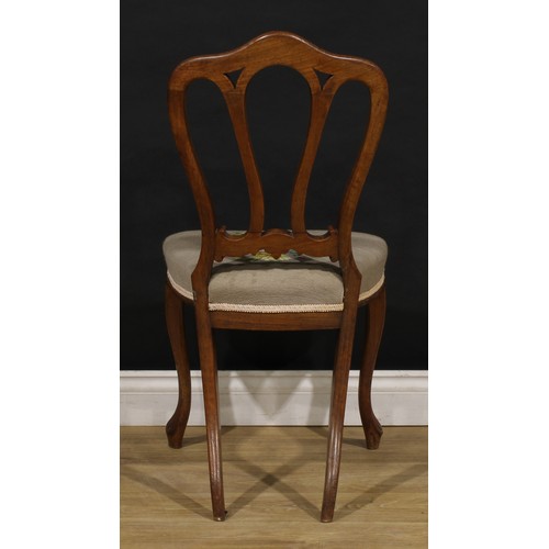 2456 - A set of six Victorian walnut dining chairs, in the French Provincial taste, stuffed-over needlework... 