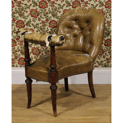 1946 - A Victorian mahogany cockfighting chair or library reading chair, stuffed-over upholstery, turned fo... 