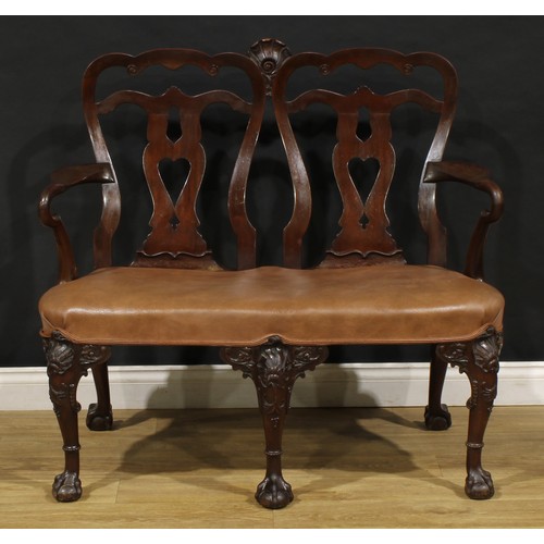 2362 - A George II Revival mahogany double-chair-back sofa, in the Irish taste, pierced vasular splats, stu... 