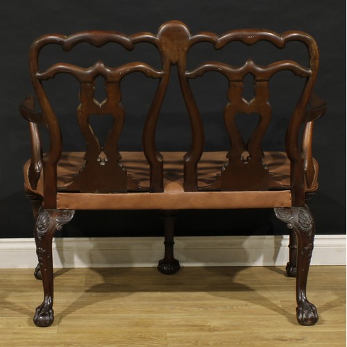 2362 - A George II Revival mahogany double-chair-back sofa, in the Irish taste, pierced vasular splats, stu... 