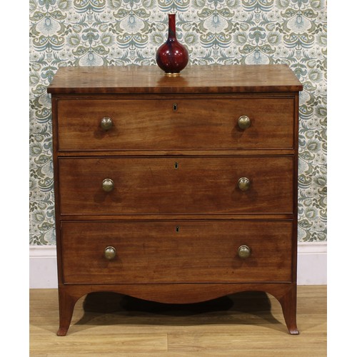 2220 - A 19th century mahogany chest, of three long graduated cockbeaded drawers, serpentine apron, bracket... 