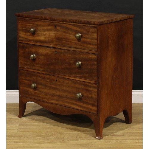 2220 - A 19th century mahogany chest, of three long graduated cockbeaded drawers, serpentine apron, bracket... 