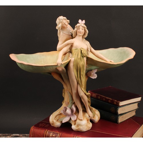 264 - A Royal Dux Art Nouveau figural centrepiece, modelled as nymphs flanked by waterlilies, 35cm high, m... 